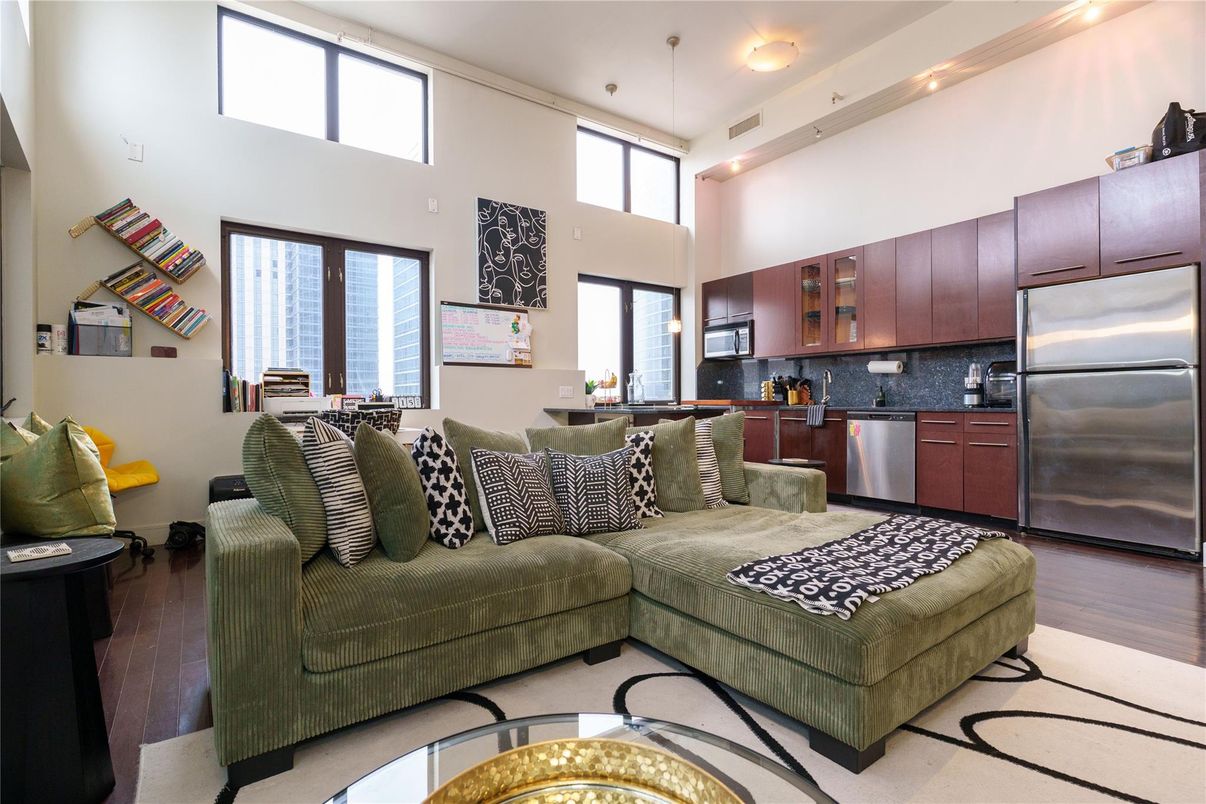 Dining room, Interior, Kitchen, Living room, Recessed Lighting, Stainless Steel Appliances, Wood Texture Flooring