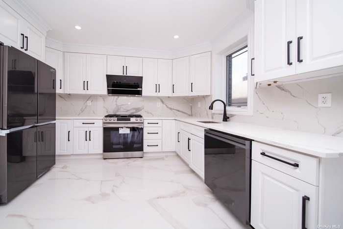 Interior, Kitchen, Marble, Marble Walls, Recessed Lighting, Stainless Steel Appliances