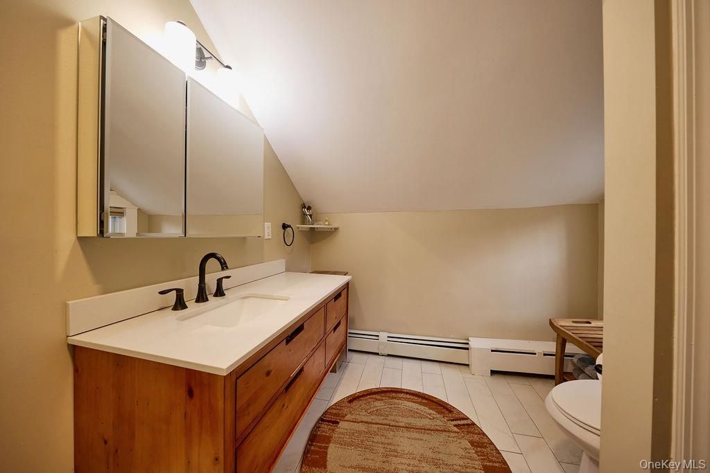 Bathroom, Dual Sink Vanities, Interior, Tile Countertops, Wood Texture Flooring