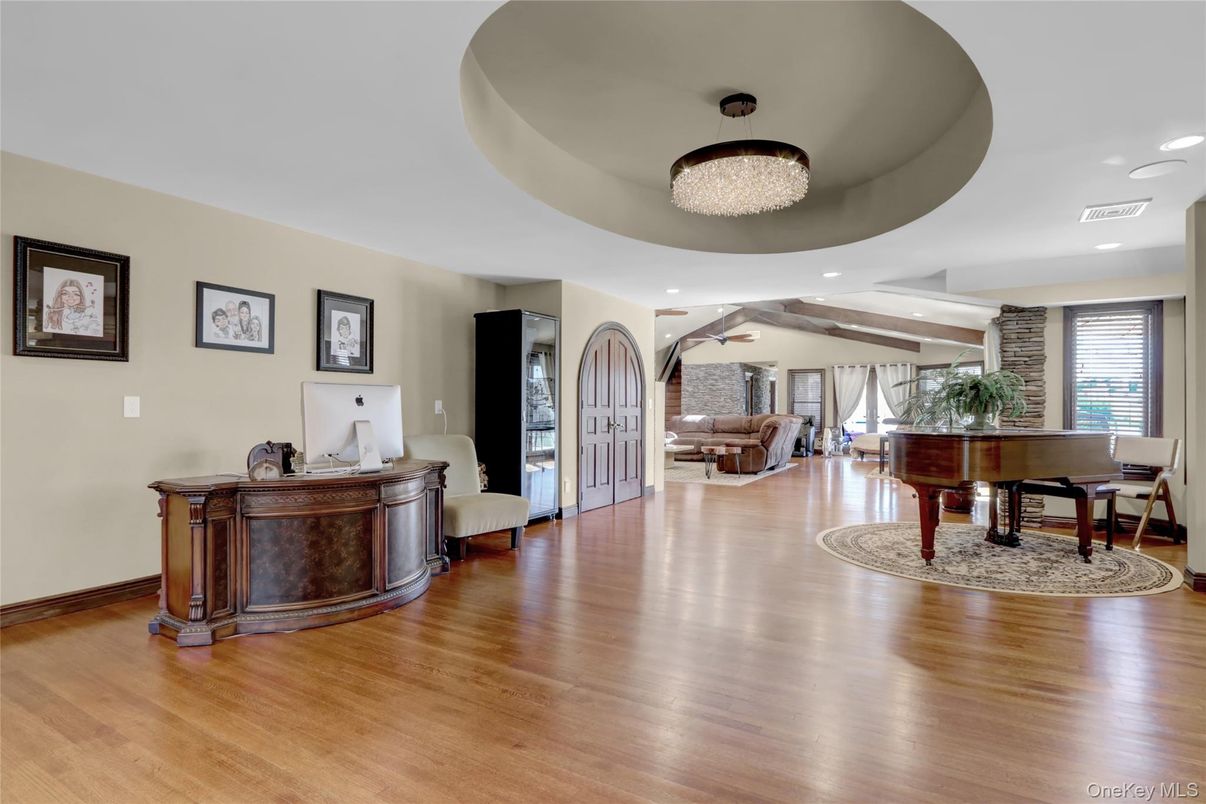 Chandelier, Interior, Living room, Piano, Recessed Lighting, Wood Texture Flooring