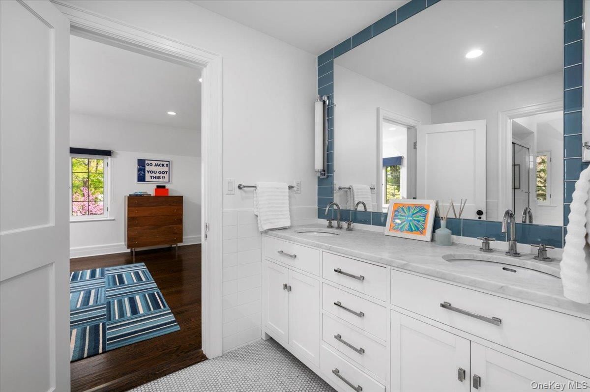 Bathroom, Dual Sink Vanities, Interior, Recessed Lighting, Wood Texture Flooring