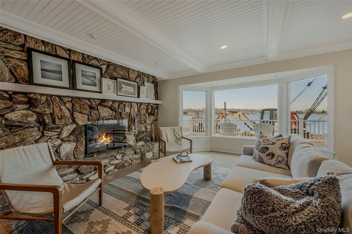 Fireplace, Interior, Living room, Recessed Lighting, Stone Walls, Water