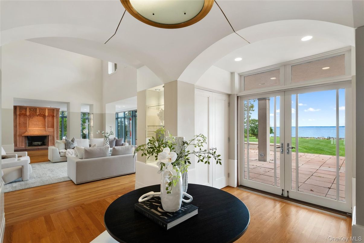 Fireplace, Interior, Living room, Recessed Lighting, Water, Wood Texture Flooring