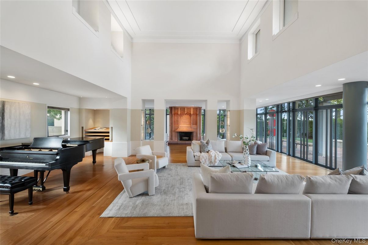 Fireplace, Interior, Living room, Piano, Recessed Lighting, Wood Texture Flooring