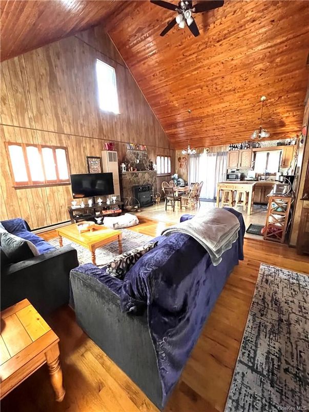 Dining room, Fireplace, Interior, Kitchen, Living room, Pendant Lights, Wooden Ceilings, Wood Texture Flooring, Wooden Walls