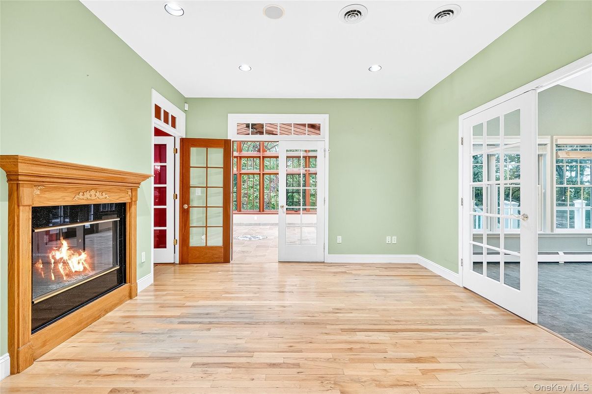 Empty room, Fireplace, Interior, Recessed Lighting, Wood Texture Flooring