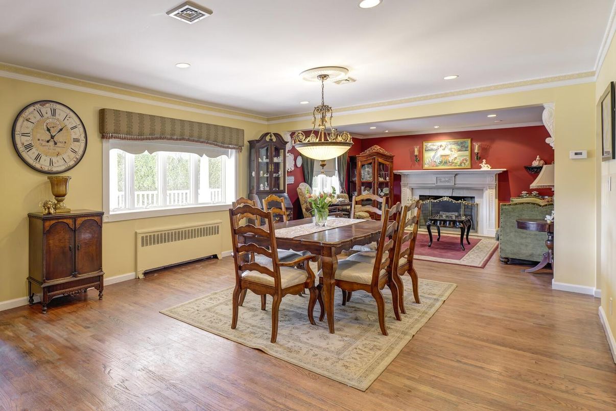 Dining room, Fireplace, Interior, Pendant Lights, Piano, Recessed Lighting, Wood Texture Flooring