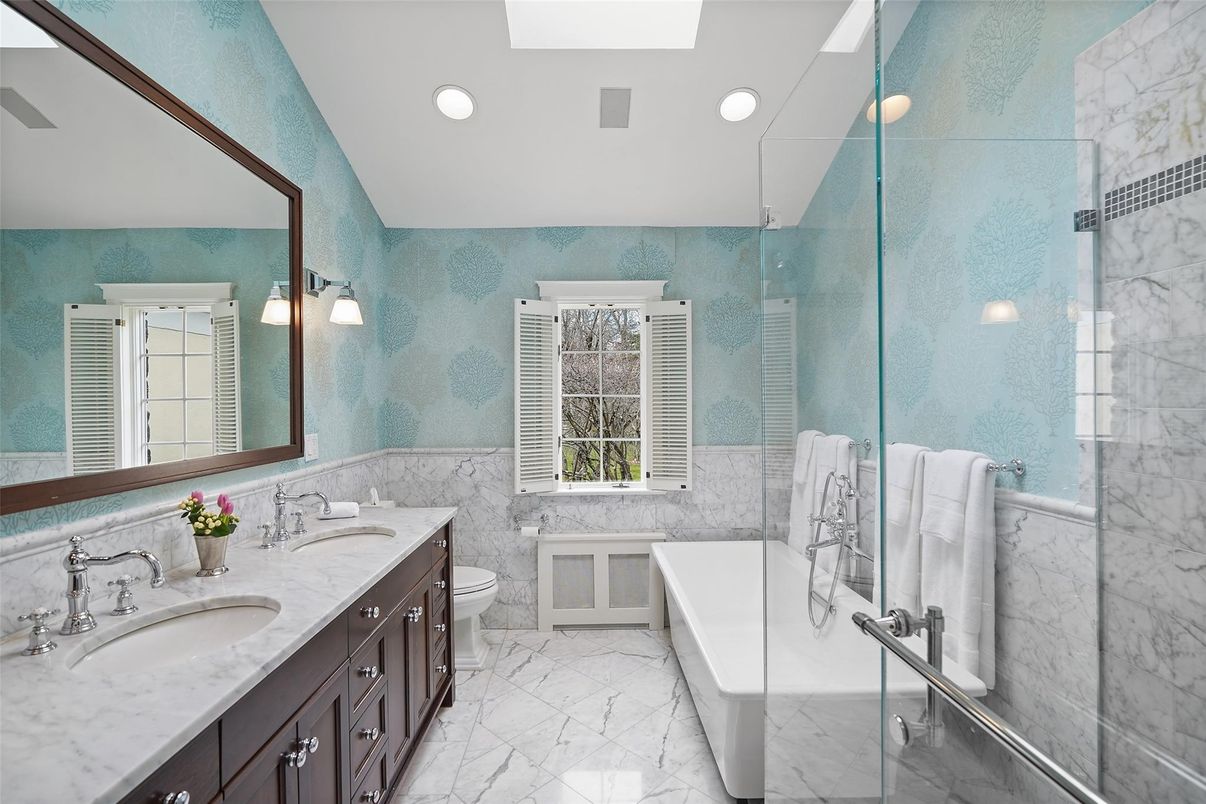 Bathroom, Dual Sink Vanities, Glass Shower, Interior, Marble, Marble Walls, Recessed Lighting