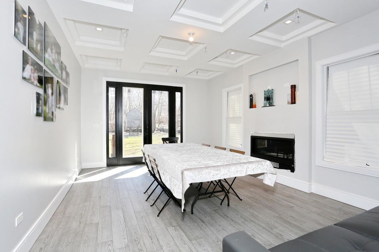 Bedroom, Fireplace, Interior, Recessed Lighting, Wood Texture Flooring