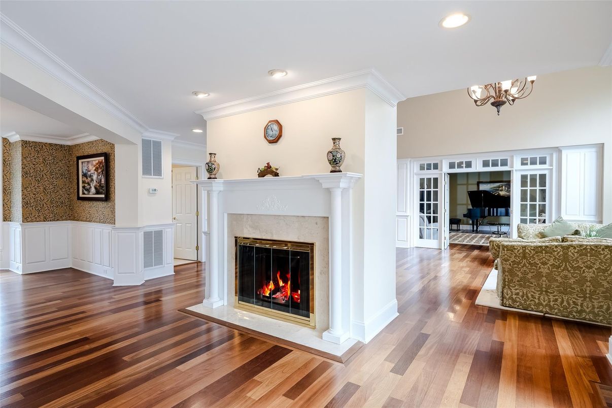 Chandelier, Fireplace, Interior, Living room, Recessed Lighting, Wood Texture Flooring