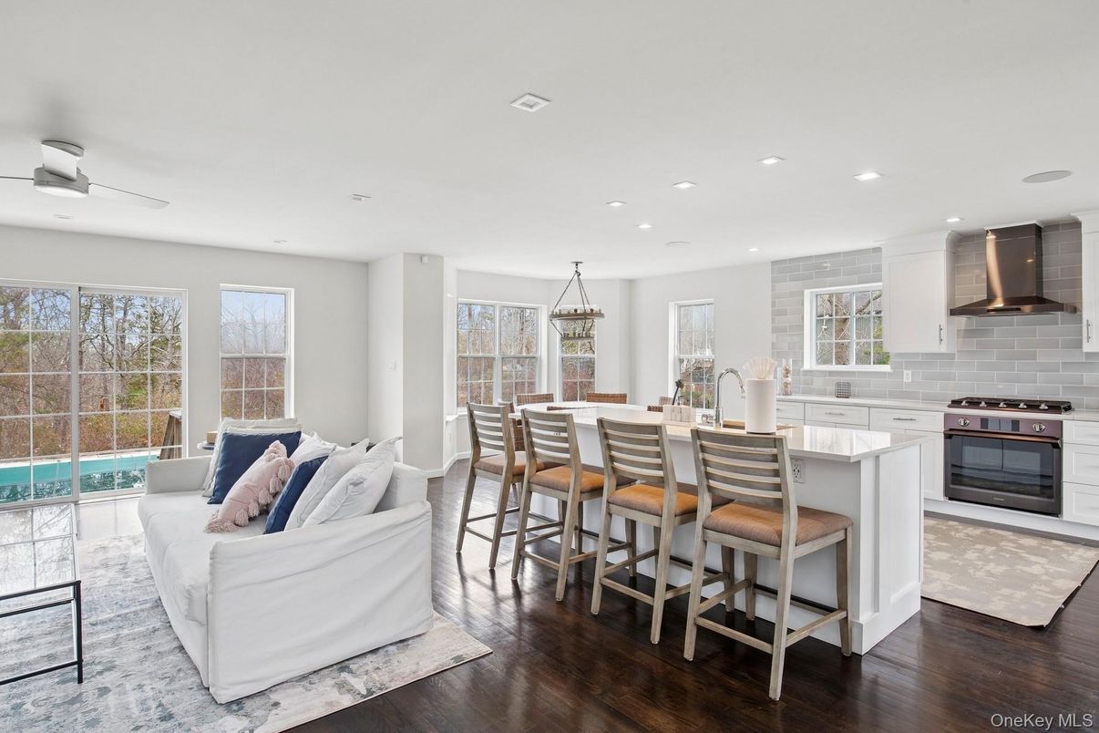 Dining room, Interior, Kitchen, Living room, Pendant Lights, Recessed Lighting, Stainless Steel Appliances, Wood Texture Flooring