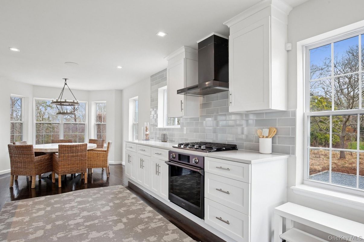 Dining room, Interior, Kitchen, Pendant Lights, Recessed Lighting, Stainless Steel Appliances, Wood Texture Flooring