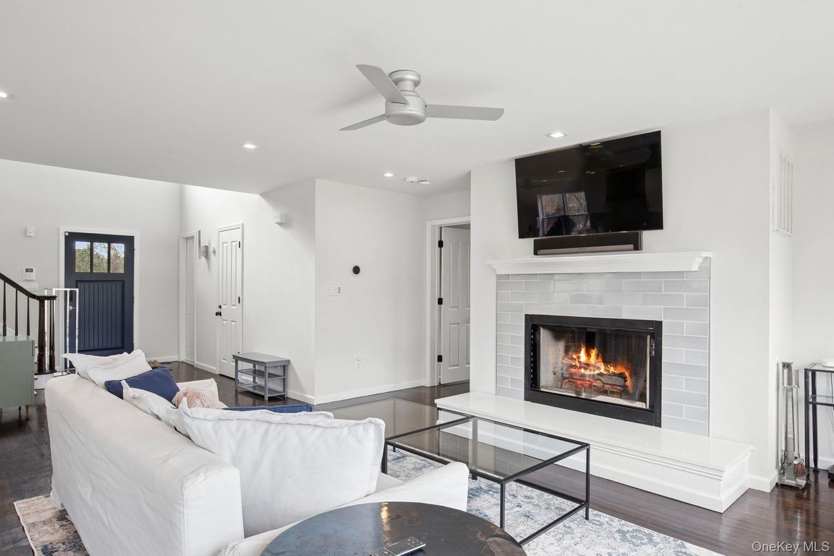 Fireplace, Interior, Living room, Recessed Lighting, Wood Texture Flooring
