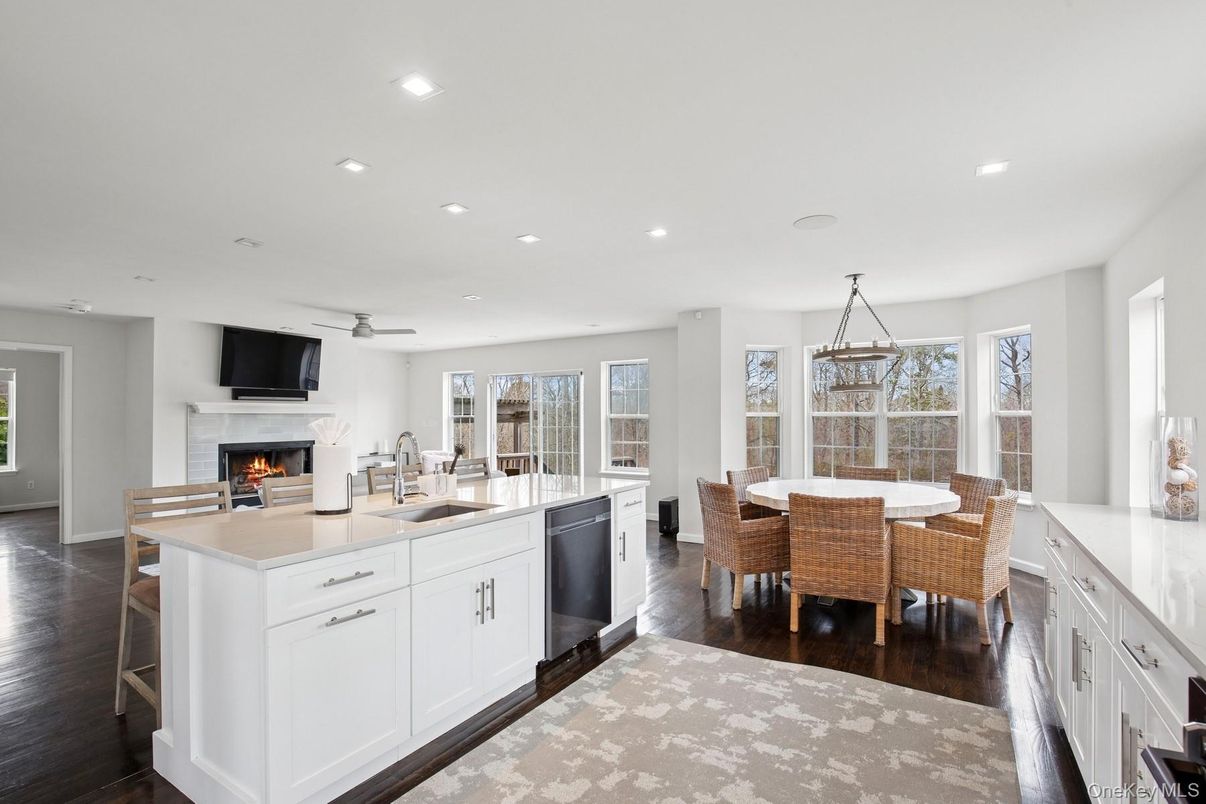Dining room, Fireplace, Interior, Kitchen, Pendant Lights, Recessed Lighting, Wood Texture Flooring