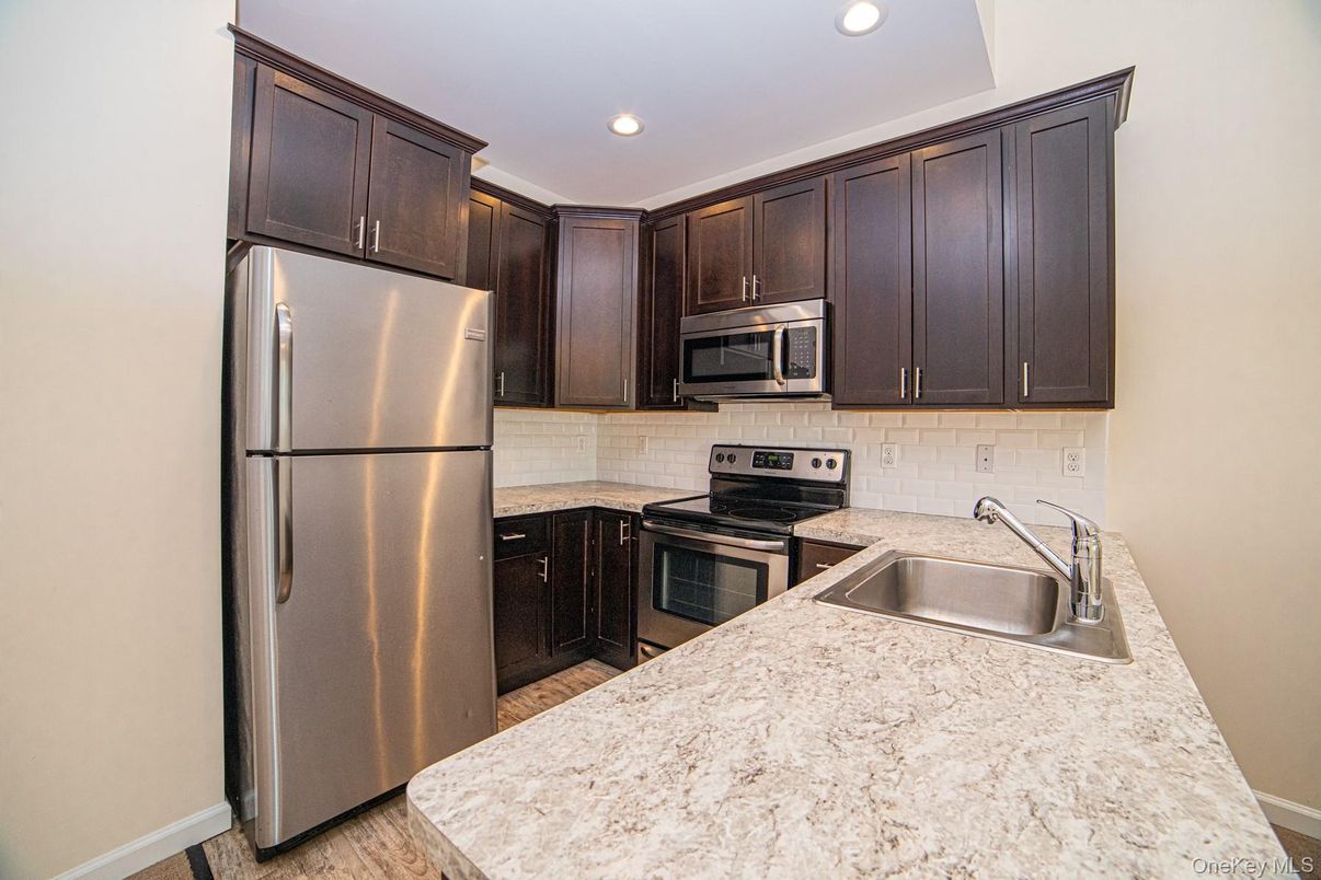 Interior, Kitchen, Recessed Lighting, Stainless Steel Appliances, Wood Texture Flooring