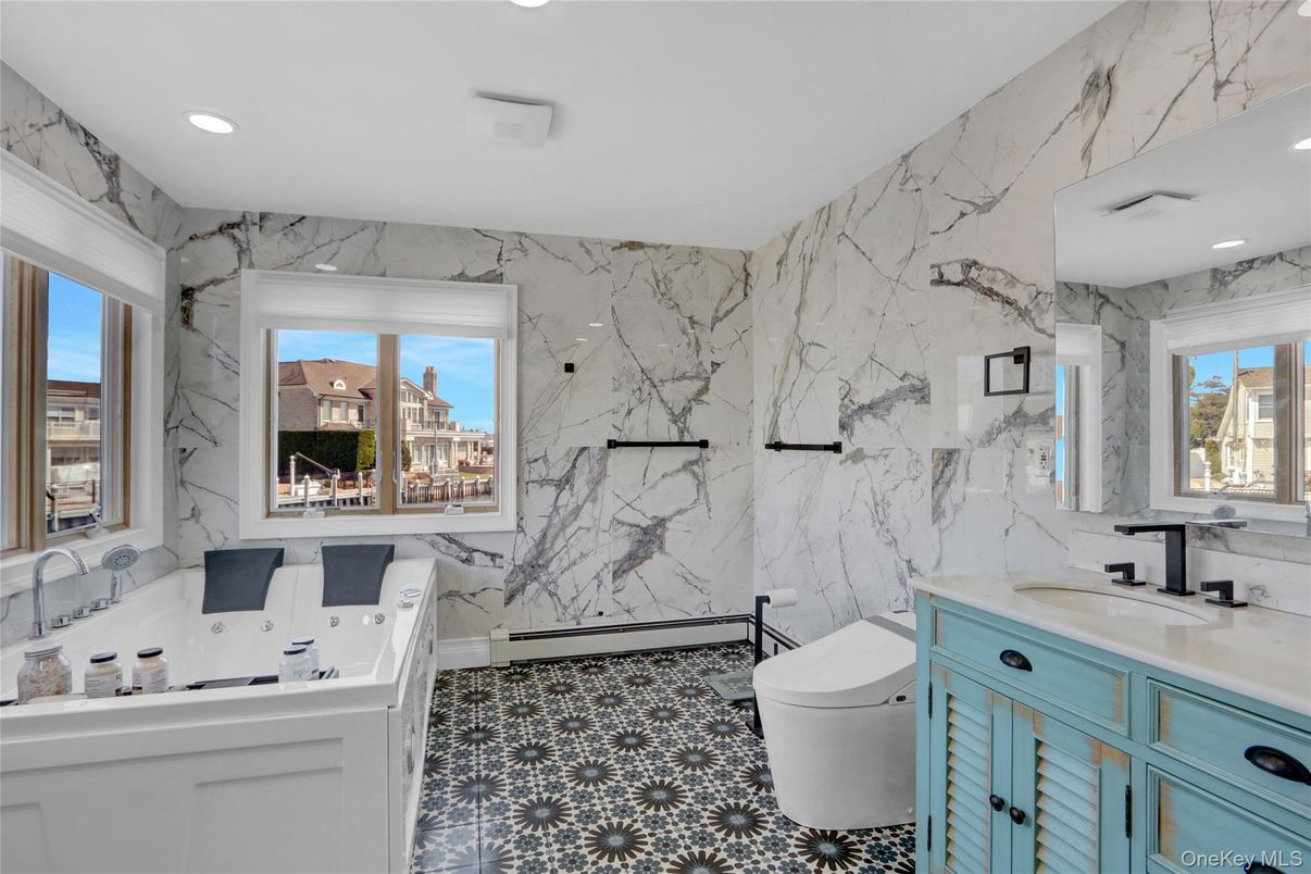 Bathroom, Dual Sink Vanities, Interior, Marble Walls, Recessed Lighting