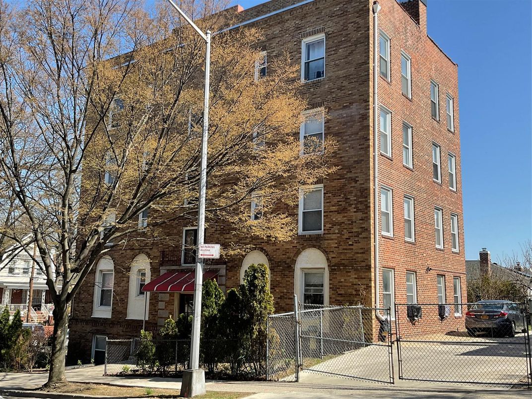 Exterior, Facade, Brick Facade, Condo Building