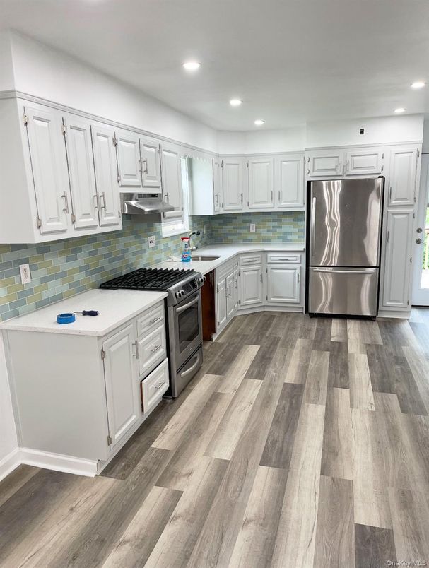 Interior, Kitchen, Recessed Lighting, Stainless Steel Appliances, Wood Texture Flooring