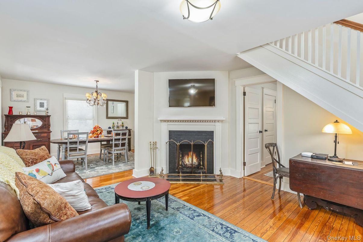 Chandelier, Dining room, Fireplace, Interior, Living room, Wood Texture Flooring