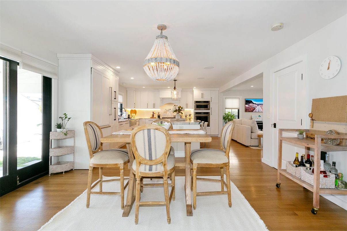 Chandelier, Dining room, Interior, Kitchen, Recessed Lighting, Stainless Steel Appliances, Wood Texture Flooring