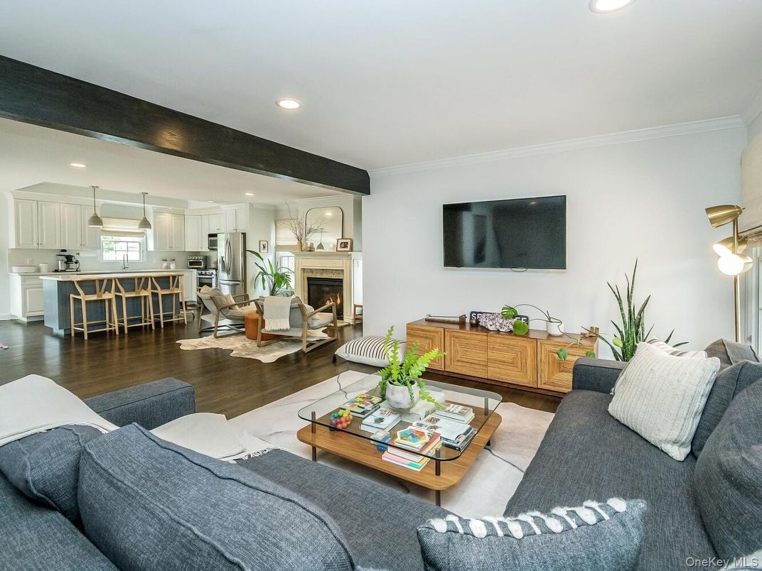 Fireplace, Interior, Kitchen, Living room, Recessed Lighting, Stainless Steel Appliances, Wood Texture Flooring