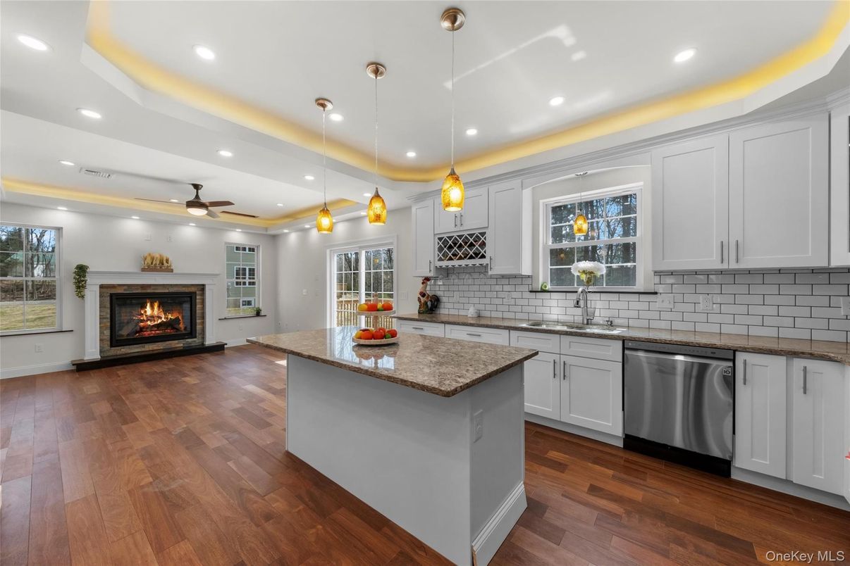 Fireplace, Interior, Kitchen, Pendant Lights, Recessed Lighting, Stainless Steel Appliances, Wood Texture Flooring