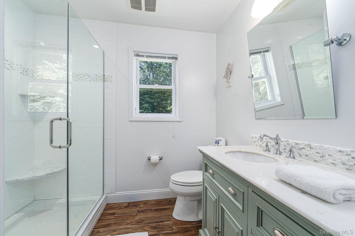Bathroom, Dual Sink Vanities, Glass Shower, Interior, Wood Texture Flooring