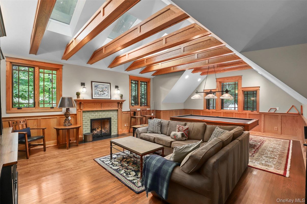 Billiard Table, Fireplace, Game Room, Interior, Living room, Pendant Lights, Recessed Lighting, Wooden Beams, Wood Texture Flooring