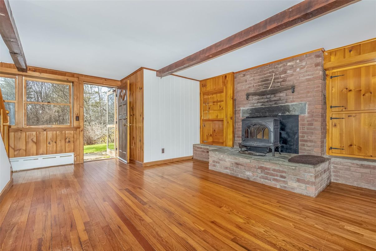 Empty room, Fireplace, Interior, Stone Walls, Wooden Beams, Wood Texture Flooring, Wooden Walls