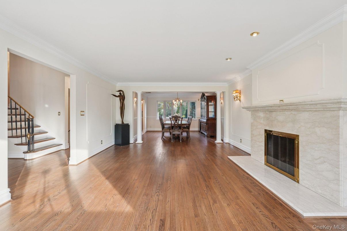 Chandelier, Dining room, Fireplace, Interior, Recessed Lighting, Wood Texture Flooring