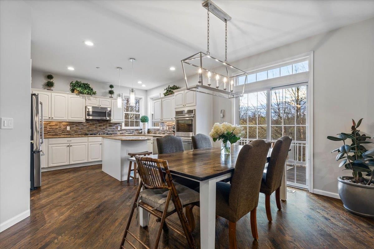 Dining room, Interior, Kitchen, Pendant Lights, Recessed Lighting, Stainless Steel Appliances, Wood Texture Flooring