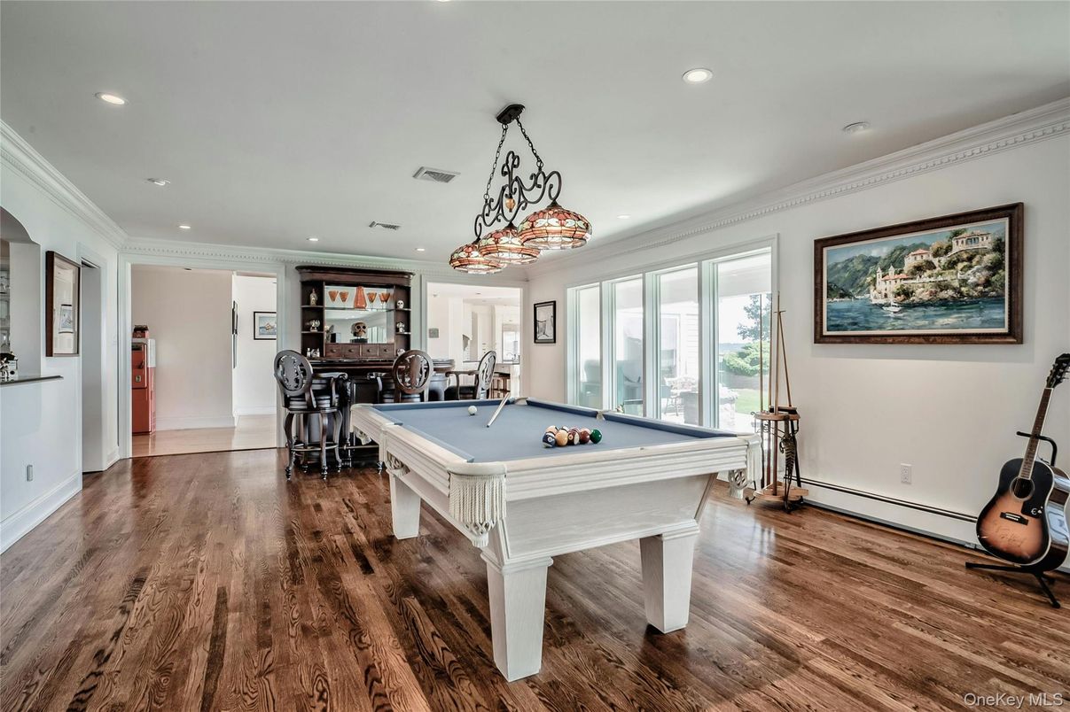 Billiard Table, Chandelier, Game Room, Interior, Pendant Lights, Recessed Lighting, Wood Texture Flooring