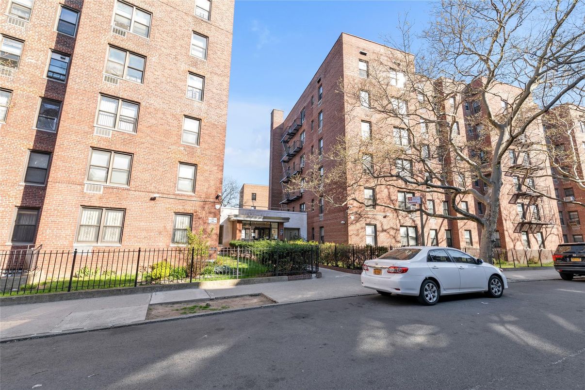 Exterior, Facade, Brick Facade, Condo Building