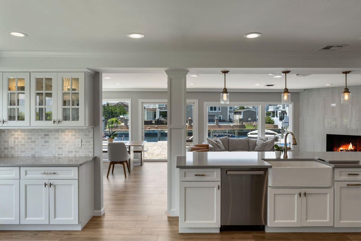 Dining room, Fireplace, Interior, Kitchen, Living room, Pendant Lights, Recessed Lighting, Stainless Steel Appliances, Wood Texture Flooring