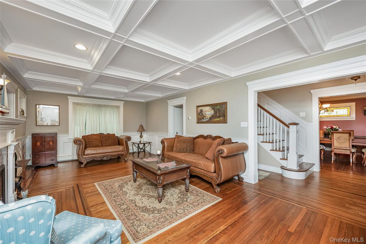 Dining room, Fireplace, Interior, Living room, Recessed Lighting, Wood Texture Flooring