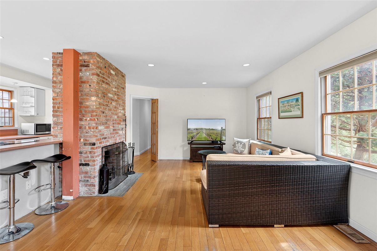 Fireplace, Interior, Recessed Lighting, Stone Walls, Wood Texture Flooring