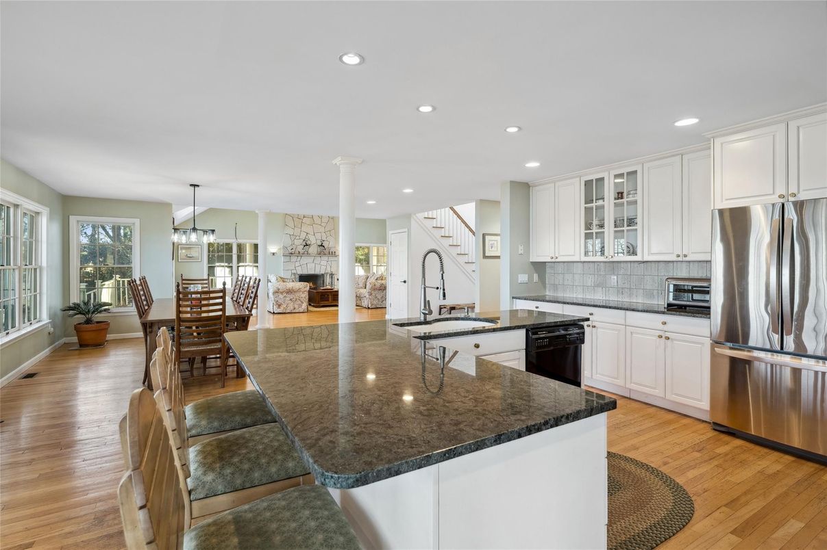 Dining room, Interior, Kitchen, Pendant Lights, Recessed Lighting, Stainless Steel Appliances, Wood Texture Flooring