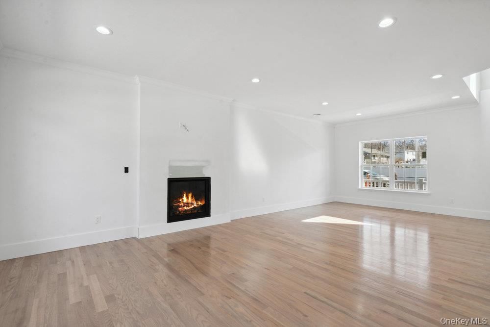 Empty room, Fireplace, Interior, Recessed Lighting, Wood Texture Flooring