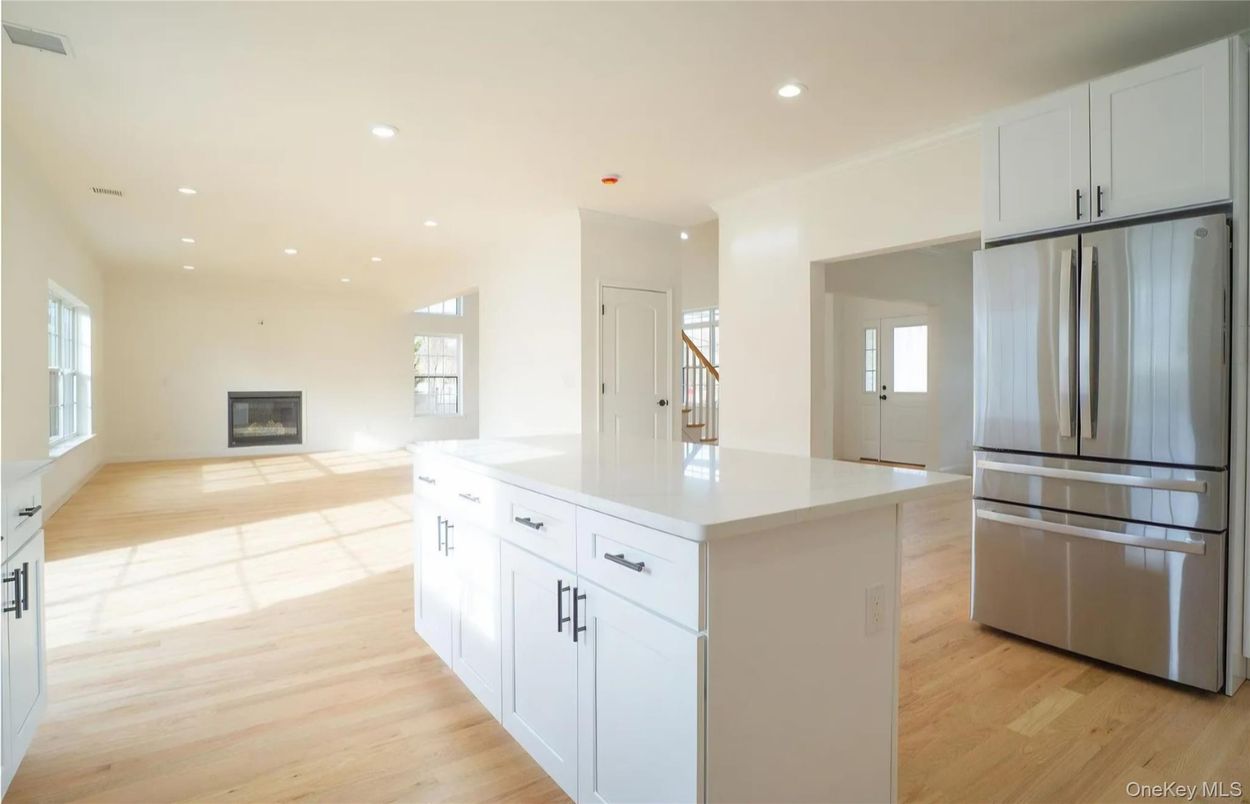 Fireplace, Interior, Kitchen, Recessed Lighting, Stainless Steel Appliances, Wood Texture Flooring