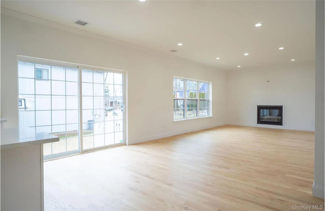 Empty room, Fireplace, Interior, Recessed Lighting, Wood Texture Flooring
