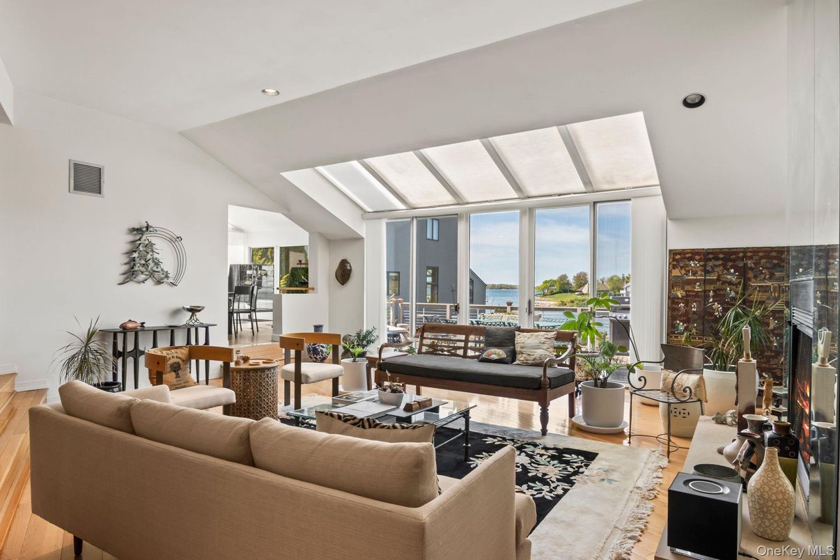 Dining room, Interior, Living room, Recessed Lighting, Water, Wood Texture Flooring