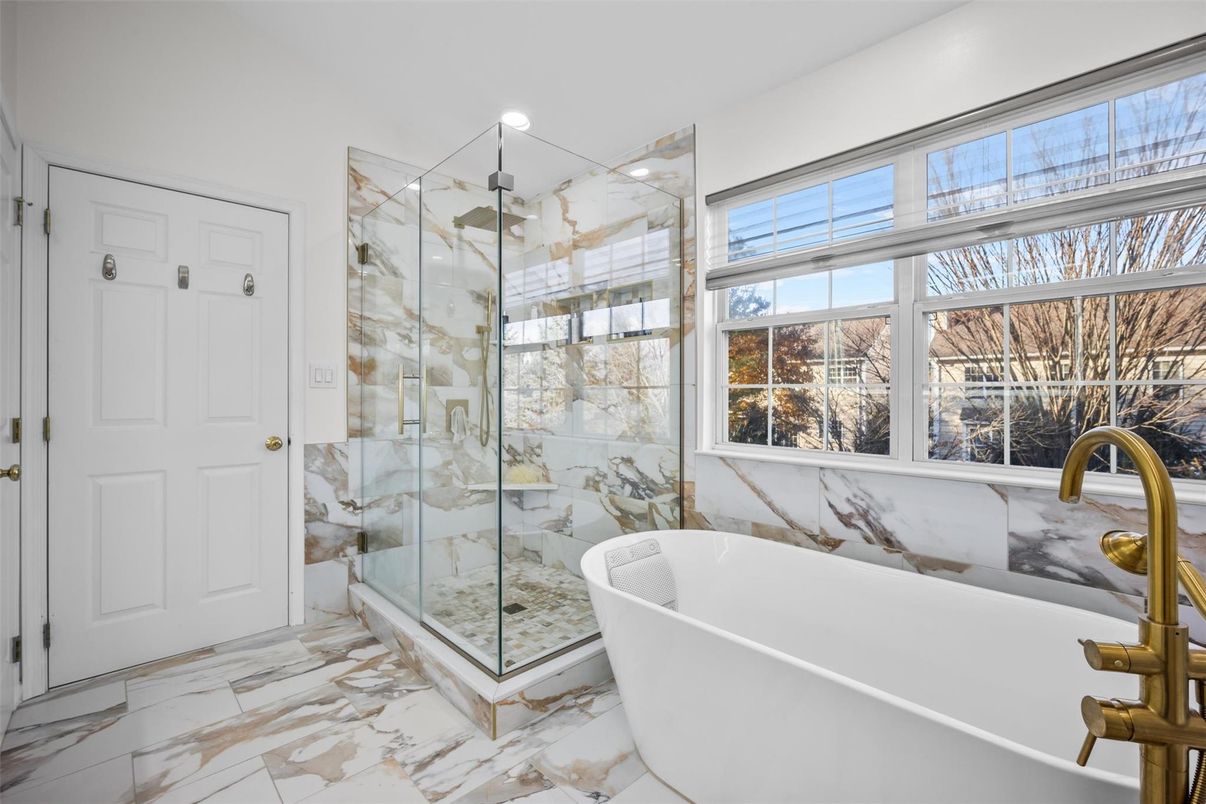 Bathroom, Free Standing Baths, Glass Shower, Interior, Marble, Marble Walls, Recessed Lighting