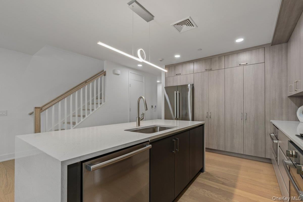 Interior, Kitchen, Pendant Lights, Recessed Lighting, Stainless Steel Appliances, Wood Texture Flooring