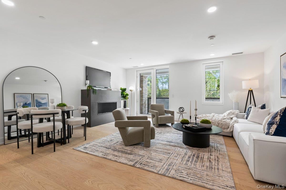 Dining room, Fireplace, Interior, Living room, Recessed Lighting, Wood Texture Flooring