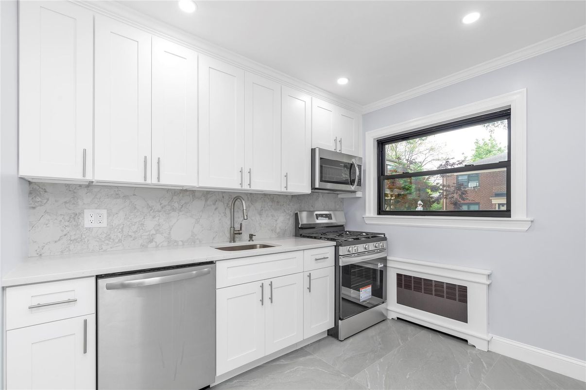 Interior, Kitchen, Marble, Marble Walls, Recessed Lighting, Stainless Steel Appliances