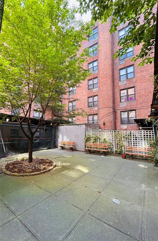 Exterior, Facade, Brick Facade, Condo Building