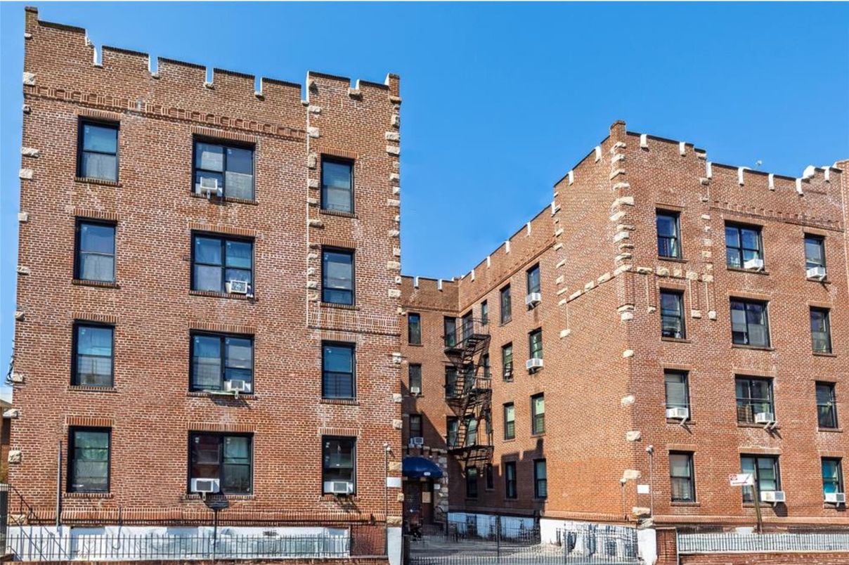Exterior, Facade, Brick Facade, Condo Building