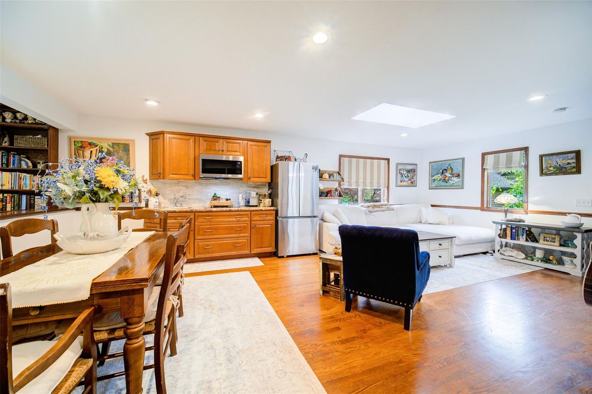 Dining room, Interior, Kitchen, Living room, Recessed Lighting, Stainless Steel Appliances, Wood Texture Flooring