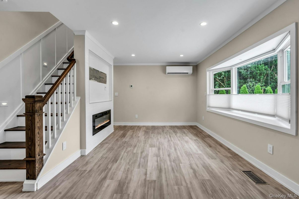 Empty room, Fireplace, Interior, Recessed Lighting, Wood Texture Flooring