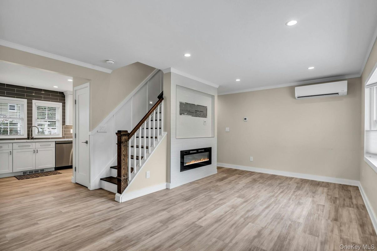 Empty room, Fireplace, Interior, Recessed Lighting, Wood Texture Flooring